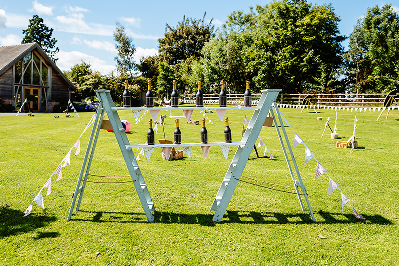 Younger guests can be entertained with garden games on the lawns at Mythe Barn wedding venue in Leicestershire