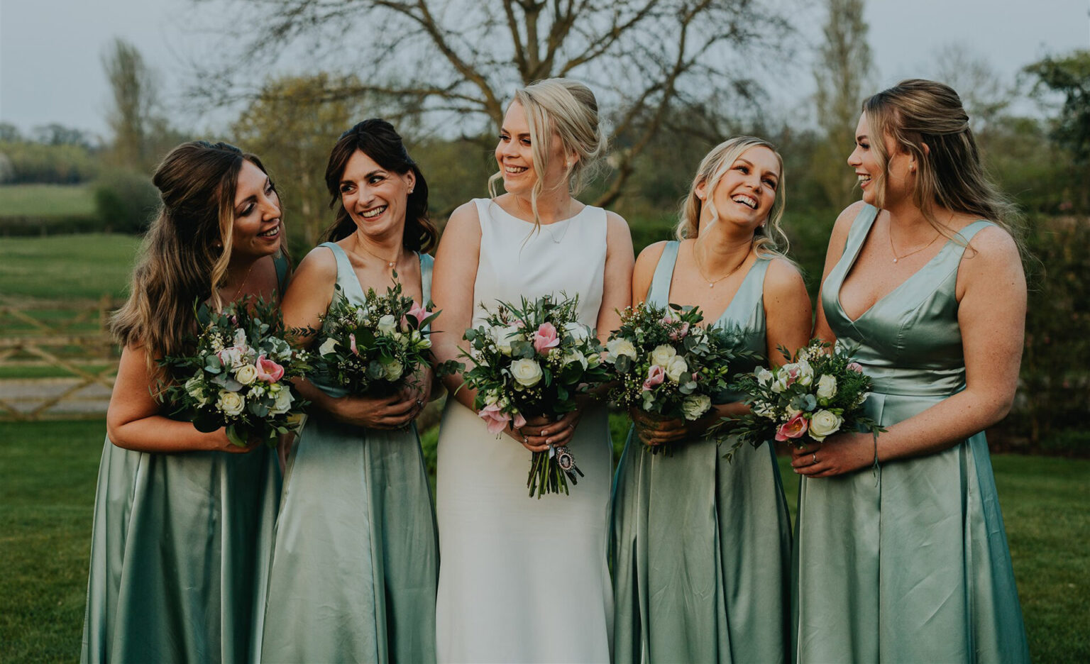 Mythe Barn spring wedding bride and bridesmaids